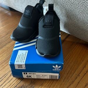Brand new black Adidas sneakers